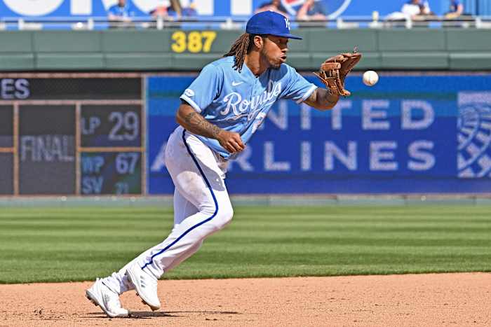 Apr 10, 2022; Kansas City, Missouri, USA; Kansas City Royals shortstop Adalberto Mondesi (27) fields a ground ball during the seventh inning against the Cleveland Guardians at Kauffman Stadium. Mandatory Credit: Peter Aiken-USA TODAY Sports